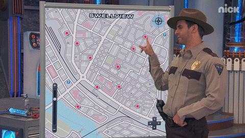 Sheriff character drawing on a digital board displaying a map.